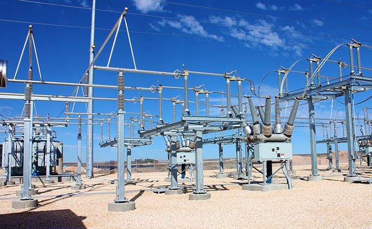 Engineers reviewing electrical plans